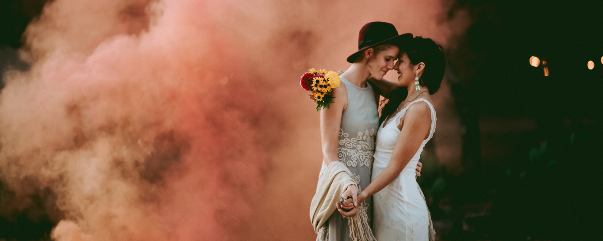 engagement photoshoot with pink smoke